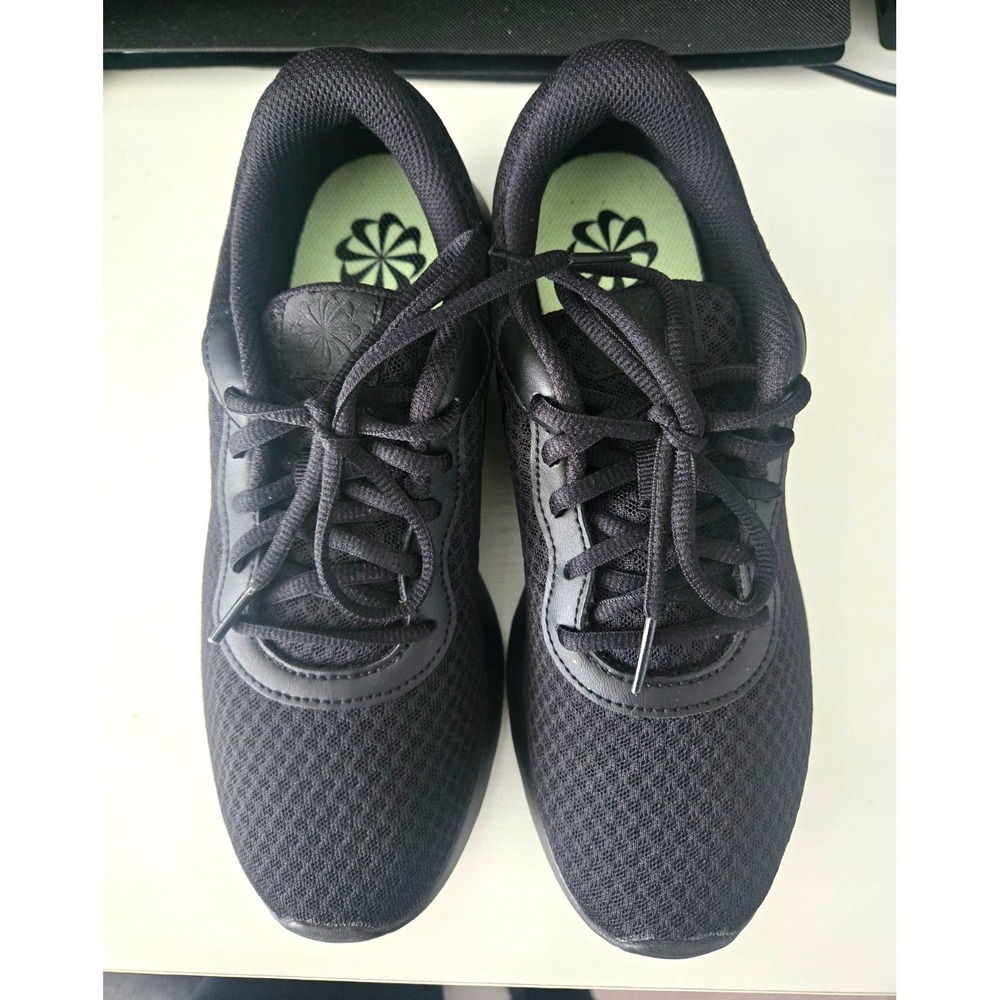 Nike Tanjun Women's Running Shoes in the "Triple Black" colorway Size 7.5